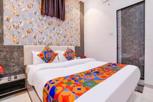 FabExpress Dhanlaxmi Residency