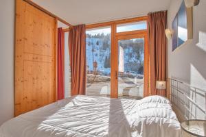 Appartements Les Flocons : photos des chambres