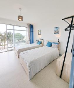 Appartements L-Oceanic - APPARTEMENT VUE MER, 50m DE LA PLAGE, RESIDENCE, TERRAIN DE TENNIS, WIFI : photos des chambres