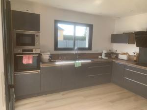 Maison de plein pied à Arnage proche du circuit