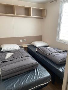 Maisons de vacances Chez Maxime - E33 - Clim TV Lave-vaisselle - Proche Europa Park et Rulantica : photos des chambres