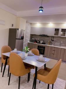 mordern living apartment with heated swimming pool fully equipped gym ample parking space and children playing ground and a relaxing rooftop with breathtaking scenic views