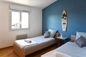 Maisons de vacances Les Roses Tremieres - A 1km de la gare garage : photos des chambres