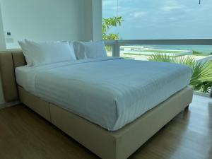 Beachfront Bliss at Naiyang Phuket by ALPHATEL