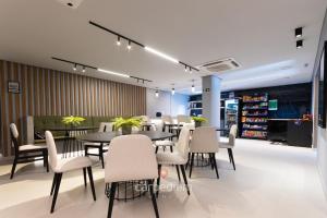 Breeze Residence #413 - Studio Duplo por Carpediem