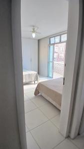 quartos num apartamento próximo a praia da Barra