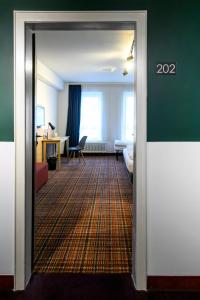 Standard Triple Room room in Novum Hotel Ambassador