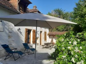 Maisons de vacances Ravissante longere avec grand jardin et cheminee : photos des chambres