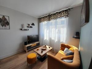 Appartements Ravissant appart' central : photos des chambres