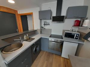 Appartements Ravissant appart' central : photos des chambres
