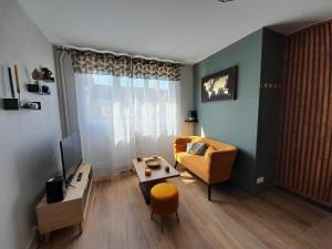 Appartements Ravissant appart' central : photos des chambres