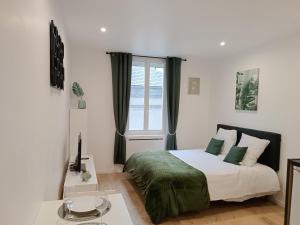 Appartements Garnavie - Centre ville - Les Halles : photos des chambres