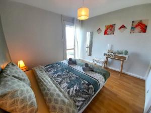 Appartements Ravissant appart-2chb-3 lits-wifi : photos des chambres