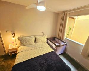 Refúgio Exclusivo a 150m da Praia Grande - Ar-Condicionado - WiFi rápido - Estacionamento Grátis