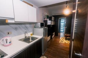 Air residence Snuggle in Style 1 BR condo Makati swim gym park surf 300 Mb