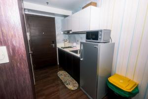 Air residence Snuggle in Style 1 BR condo Makati swim gym park surf 300 Mb