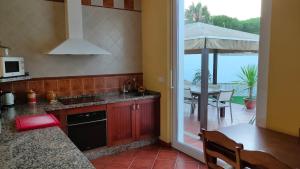 Villa con piscina junto a la playa