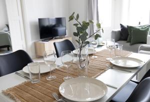 2ndhomes Central 2BR Apartment with Sauna & Balcony