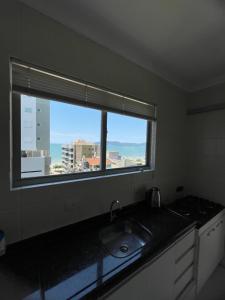 Apto vista mar em Meia Praia