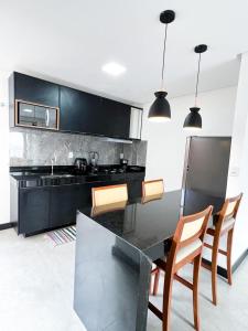 A6 2 quartos sala coz deck frent piscina · Alicena Muta Cond - apto A6