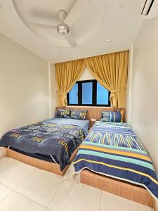 NEWLY REnOVATED Comfy Beachfront View at Seri Bulan Port Díckson