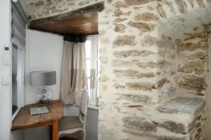 Appartements Charming historic gem with modern flair in Leynhac : photos des chambres
