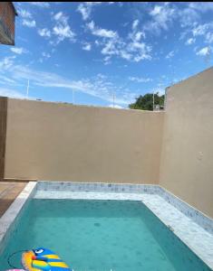 Linda casa a 100 metros da praia!