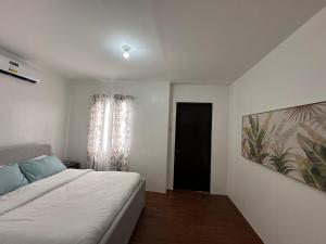 Almond drive 2BR Townhouse Near SRP Nustar Talisay