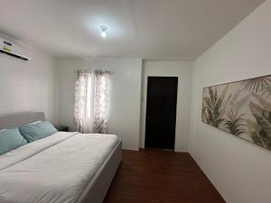 Almond drive 2BR Townhouse Near SRP Nustar Talisay