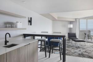 King Suite with Sofa Bed and Ocean View room in Ocean Breeze Club