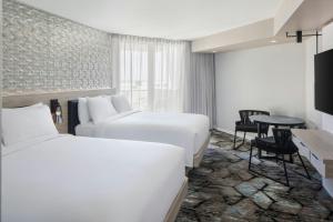 Queen Room with Two Queen Beds room in Ocean Breeze Club