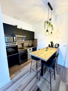 Appartements Le Grand Port - T2 with parking : photos des chambres