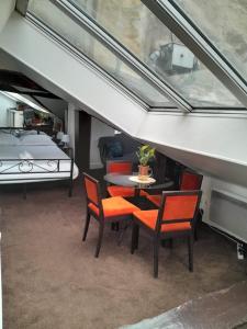 Appartements Le Singulier - Studio au coeur de Paris : photos des chambres
