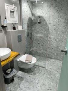 Triple Room with Side Sea View room in Hotel Almira