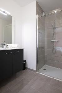 Appartements Le Normand - Spacieux T4 neuf avec 3 salles d’eaux : photos des chambres