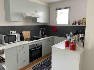 Appartements Joli appartement renove avec jardin clos : photos des chambres