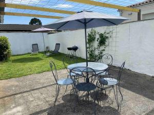 Appartements Joli appartement renove avec jardin clos : photos des chambres