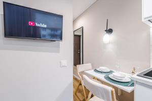 Stylish white salad studio near the city center