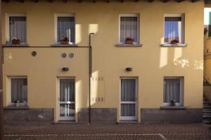 Sweet house at the old bridge of Lecco