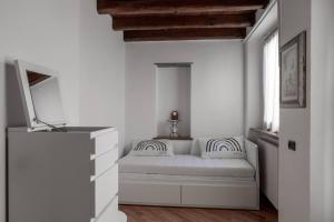 Sweet house at the old bridge of Lecco