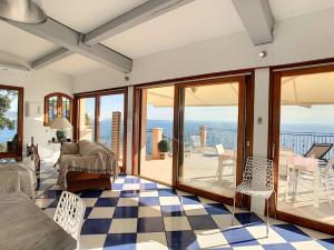 Villas Sur les hauteurs de Theoule villa avec une magnifique vue mer : photos des chambres