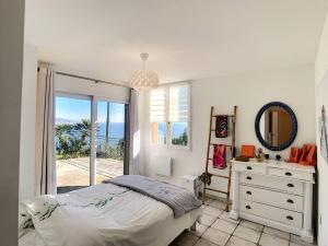 Villas Sur les hauteurs de Theoule villa avec une magnifique vue mer : photos des chambres