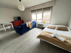 Appartements Saint Exupery Parking Wifi Un Sejour a Part : photos des chambres