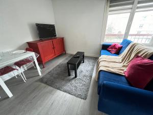 Appartements Saint Exupery Parking Wifi Un Sejour a Part : photos des chambres