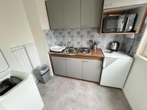 Appartements Saint Exupery Parking Wifi Un Sejour a Part : photos des chambres