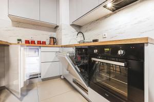 Komfort z balkonem w centrum