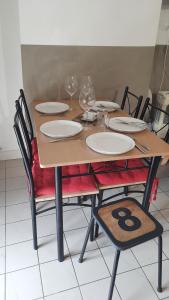 Appartements La Mansarde : photos des chambres