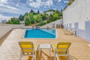 Apartment in center with pool (Colina Branca)