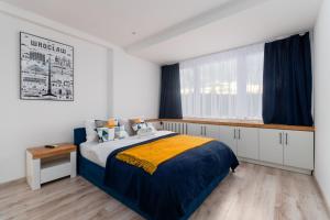 Plac Grunwaldzki Inviting Apartment by BookingHost