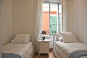 Appartements LARA AP4441 By Riviera Holiday Homes : photos des chambres